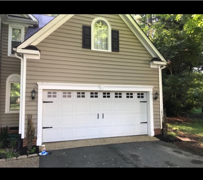 New Carriage House Garage Door Accents with Simple Decor
